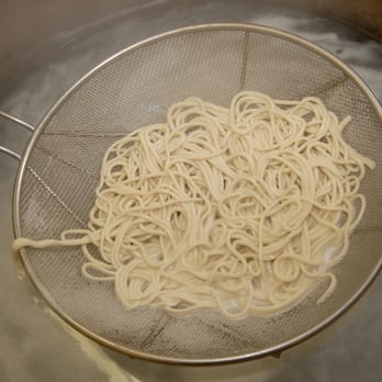 Nu-Do - noodles being cooked in a frying pan - Chinese Near Me - Montreal, Quebec Nu-Do - noodles being cooked in a frying pan - Chinese Near Me - Montreal, Quebec