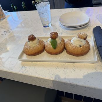 Hash Kitchen - Cannoli donuts. So big can probably be shared with up to 6 people. Not overly sweet. - Breakfast & Brunch Near Me - Pearland, Texas Hash Kitchen - Cannoli donuts. So big can probably be shared with up to 6 people. Not overly sweet. - Breakfast & Brunch Near Me - Pearland, Texas