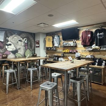 Khoury's Fine Wine & Spirits - Main (original) seating area & merch area adjacent to the bar - Beer, Wine & Spirits Near Me - Las Vegas, Nevada Khoury's Fine Wine & Spirits - Main (original) seating area & merch area adjacent to the bar - Beer, Wine & Spirits Near Me - Las Vegas, Nevada
