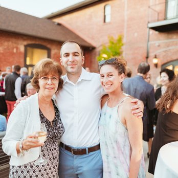 Haut Media - Group photo at wedding celebration. - Videographers Near Me Haut Media - Group photo at wedding celebration. - Videographers Near Me