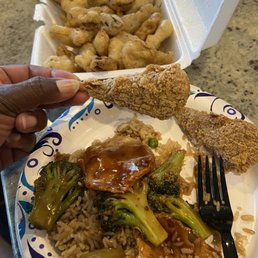 Sweet and spicy sauce chicken with fried rice, drumsticks, and fried mushrooms