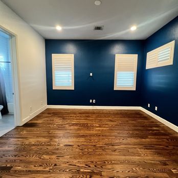 Tino's Brush & Build - Bedroom painted blue and white - Painters Near Me