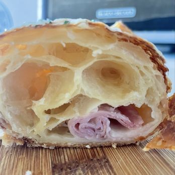 Paris Baguette - Ham and cheese croissant cut in half. No cheese, tiny shred of a piece of ham. - Bakeries Near Me - North Hollywood, California Paris Baguette - Ham and cheese croissant cut in half. No cheese, tiny shred of a piece of ham. - Bakeries Near Me - North Hollywood, California