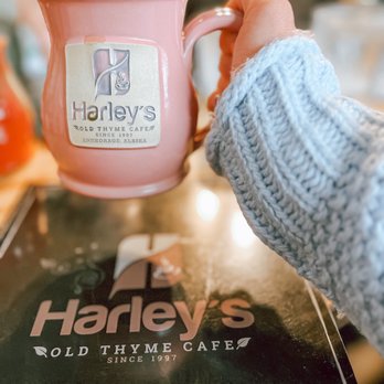 Harley's Old Thyme Cafe - a person holding a pink coffee mug - Southern Near Me - Anchorage, Alaska Harley's Old Thyme Cafe - a person holding a pink coffee mug - Southern Near Me - Anchorage, Alaska