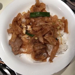 Sushi Asian Cuisine - Chow Fun with Beef over steamed rice.