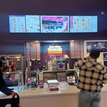 Insomnia Cookies Flagship Bakery - a man standing at a counter - Desserts Near Me - Philadelphia, Pennsylvania Insomnia Cookies Flagship Bakery - a man standing at a counter - Desserts Near Me - Philadelphia, Pennsylvania
