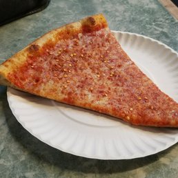 Textbook NY slice: Ultra-thin, crisp, foldable, delicious. Textbook NY slice: Ultra-thin, crisp, foldable, delicious.