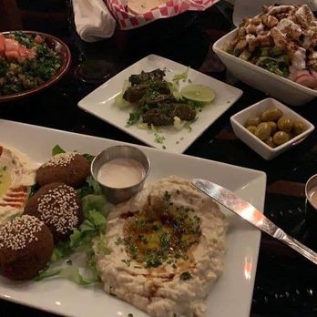 Mezze Cafe - Vegan mezze platter and chicken shawarma salad - Mediterranean Near Me - Austin, Texas