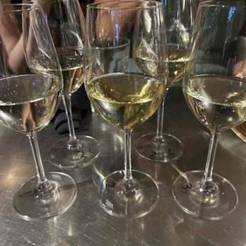 Whispering Vine Wine Co - white wine flight - Wine Bars Near Me - Reno, Nevada