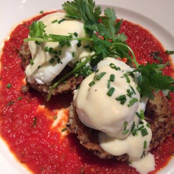Beatrix - Poached egg with quinoa cakes , fresh herbs, and tomato sauce - New American Near Me - Chicago, Illinois Beatrix - Poached egg with quinoa cakes , fresh herbs, and tomato sauce - New American Near Me - Chicago, Illinois