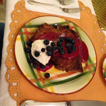Brass Pineapple Inn - Delicious French toast with Lisa's homemade raspberry sauce, fresh whipped cream and blueberries. - Hotels Near Me - Charleston, West Virginia Brass Pineapple Inn - Delicious French toast with Lisa's homemade raspberry sauce, fresh whipped cream and blueberries. - Hotels Near Me - Charleston, West Virginia