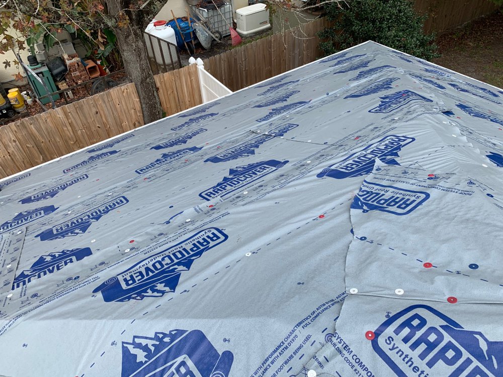 Slide of EZ Roofing of Flagler County