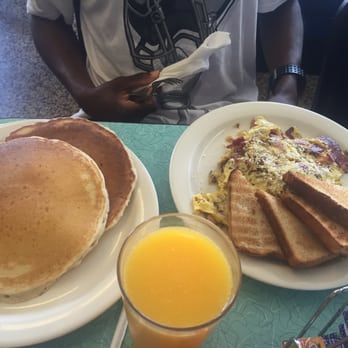 Beachside Cafe - Pancakes with the skillet dish ymmyn - Breakfast & Brunch Near Me - Indialantic, Florida Beachside Cafe - Pancakes with the skillet dish ymmyn - Breakfast & Brunch Near Me - Indialantic, Florida