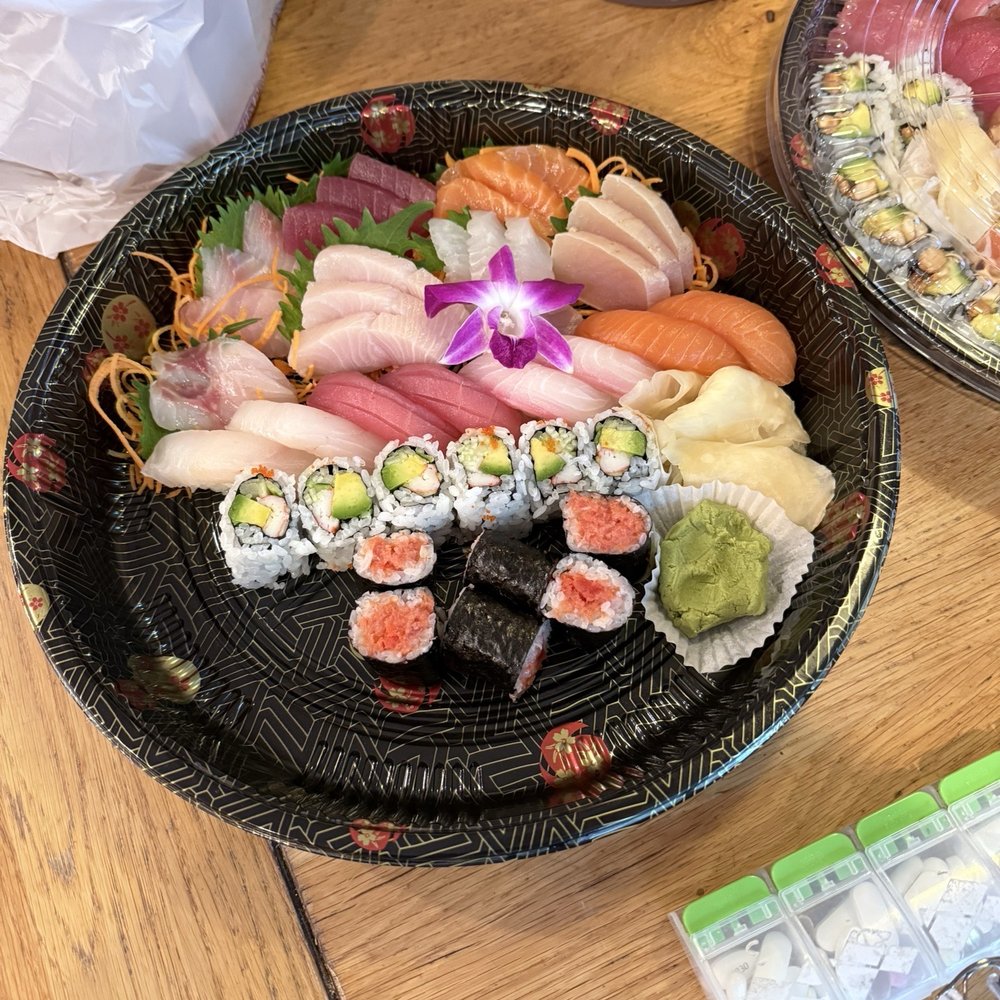 Sushi/ sashimi deluxe and various specialty rolls