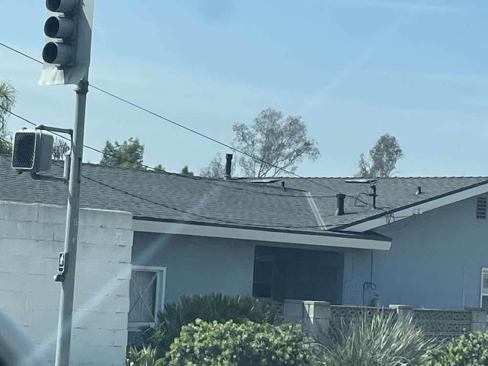 Slide of Rain Dance Roofing