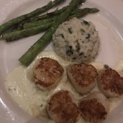 Photo of Skylines Cafe - Clayton, NC, United States. Seared scallops special with asparagus and risotto