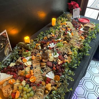 Sha-Sha Charcuterie - a table with a variety of food - Food Delivery Services Near Me Sha-Sha Charcuterie - a table with a variety of food - Food Delivery Services Near Me