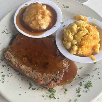 Skillets Cafe & Grill - Meatloaf with mashed potatoes and gravy and mac and cheese. - Breakfast & Brunch Near Me - Hilton Head Island, South Carolina Skillets Cafe & Grill - Meatloaf with mashed potatoes and gravy and mac and cheese. - Breakfast & Brunch Near Me - Hilton Head Island, South Carolina