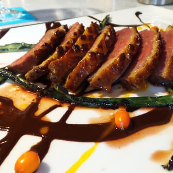 Mercer Hall - Duck breast marinated in black Swan porter soy and pepper, dark chocolate and dandelion - Bars Near Me - Stratford, Ontario Mercer Hall - Duck breast marinated in black Swan porter soy and pepper, dark chocolate and dandelion - Bars Near Me - Stratford, Ontario