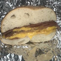 What About A Bagel - Egg, Meat & Cheese with pork roll- salt, pepper and ketchup on an everything bagel