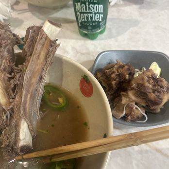 Soup Shop - Leftover oxtail bones and rib bones. Meat was so hard we couldn't eat all the meat!. - Vietnamese Near Me - South Gate, California