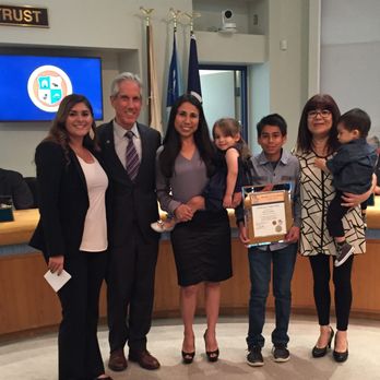 Silvia Calderon - Receiving a recognition from the Oceanside Chamber of Commerce. - Home & Rental Insurance Near Me Silvia Calderon - Receiving a recognition from the Oceanside Chamber of Commerce. - Home & Rental Insurance Near Me