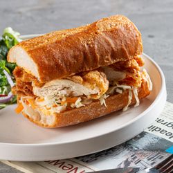 Soul Good - Butter Milk Fried Chicken, Mayo, Slaw, Tomato on Nice warm baguette. Served with Fries or Mixed Green Salad.