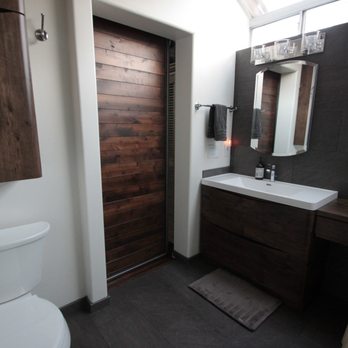 Even Construction - view of barn door from inside and toilet area - General Contractors Near Me Even Construction - view of barn door from inside and toilet area - General Contractors Near Me