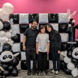 Honey's Party - Black and white panda balloon activation.