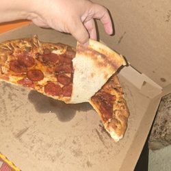 Little Ceasers - Shows bottom of crust where it wasnt even crust it was scraped off dish