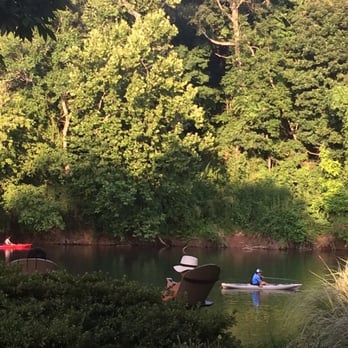 Canoe - Real canoer's indulging in the Chattahoochee River behind the restaurant. - New American Near Me - Atlanta, Georgia Canoe - Real canoer's indulging in the Chattahoochee River behind the restaurant. - New American Near Me - Atlanta, Georgia