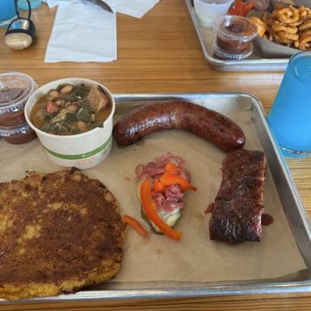 Stateline Road Smokehouse - Cornbread, pork rib, sausage and beans and greens. Jolly rancher adult slushy - Barbeque Near Me - Napa, California Stateline Road Smokehouse - Cornbread, pork rib, sausage and beans and greens. Jolly rancher adult slushy - Barbeque Near Me - Napa, California