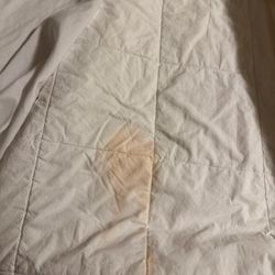 Comfort Inn & Suites - Bedding stains up close.