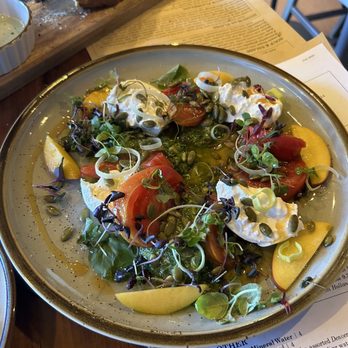 Breadery - Barada salad with marinated tomatoes, pesto, leeks and fresh peaches - New American Near Me - Crested Butte, Colorado