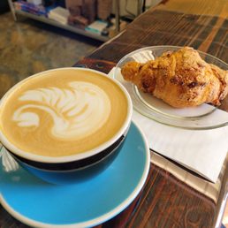 Hot Latta with rosemary honey syrup and almond croissant
