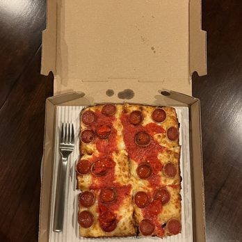 Emmy Squared Pizza - For scale standard dinner fork compare to the size of 16 inch pizza from competitors. - Pizza Near Me - Nashville, Tennessee