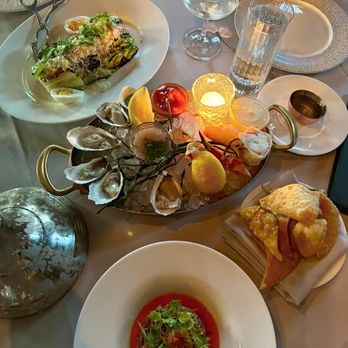 Maple & Ash - Oysters on the Half Shell Yellowfin Tuna Tartare Fork & Knife Caesar Salad Alaskan King Crab Legs - Steakhouses Near Me - Chicago, Illinois Maple & Ash - Oysters on the Half Shell Yellowfin Tuna Tartare Fork & Knife Caesar Salad Alaskan King Crab Legs - Steakhouses Near Me - Chicago, Illinois