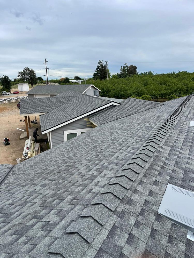 Slide of Art’s Roofing