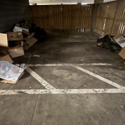 The Courts at Huntington Station - Dirty garage. Rodents(rats) ran under trash