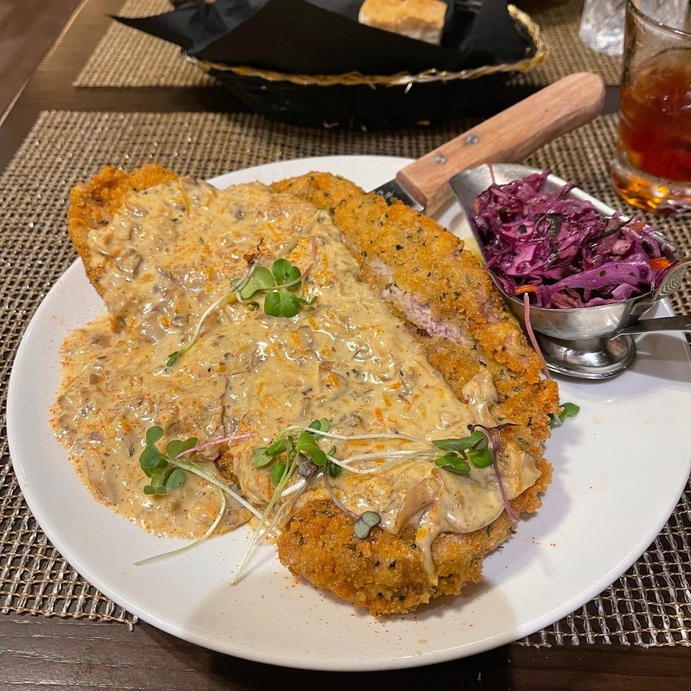 Olesia's Taverne - Schnitzel with Mashed Potatoes & Mushroom Sauce - Ukrainian Near Me - Richfield, Ohio Olesia's Taverne - Schnitzel with Mashed Potatoes & Mushroom Sauce - Ukrainian Near Me - Richfield, Ohio