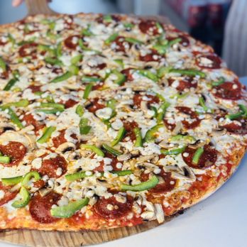 Tarino Pizza - Deluxe Party Size pizza straight out of the oven - Pizza Near Me - M3B 1Y2, Ontario Tarino Pizza - Deluxe Party Size pizza straight out of the oven - Pizza Near Me - M3B 1Y2, Ontario