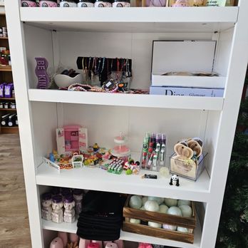 Honey Drop - a shelf full of products in a store - Bubble Tea Near Me - Pasco, Washington Honey Drop - a shelf full of products in a store - Bubble Tea Near Me - Pasco, Washington