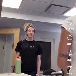 The owner on the right is refusing service to the woman in the photo because of her race