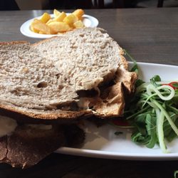 Albert's Corner - Homemade fish finger sandwich on local brown bread. Huge, crispy, delicious, and hand cut chips.