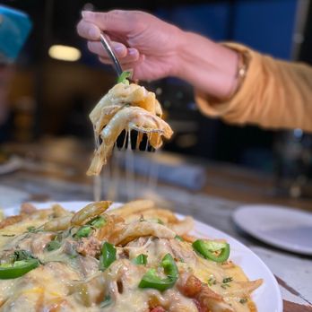 Ogden Beer Company - Pork Chile Verde Cheese Fries - Brewpubs Near Me - Ogden, Utah Ogden Beer Company - Pork Chile Verde Cheese Fries - Brewpubs Near Me - Ogden, Utah