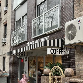 Copper Mug Coffee - a woman sitting outside a coffee shop - Coffee & Tea Near Me - Brooklyn, New York Copper Mug Coffee - a woman sitting outside a coffee shop - Coffee & Tea Near Me - Brooklyn, New York