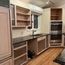 Pro Painting Plus - BEFORE: Cabinet doors being removed
