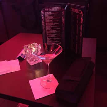 Mezzo - a wine glass and menu on a table - Dance Clubs Near Me - Providence, Rhode Island Mezzo - a wine glass and menu on a table - Dance Clubs Near Me - Providence, Rhode Island