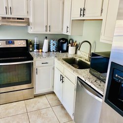 Custom Colors Paint & Flooring Center - Kitchen cabinets