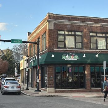 Cantina Mexicana - a woman walking across the street - Mexican Near Me - Norwalk, Connecticut